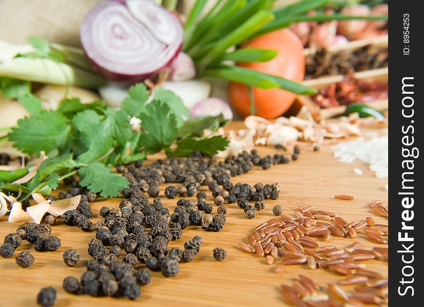 Fresh grains and spices with vegetables