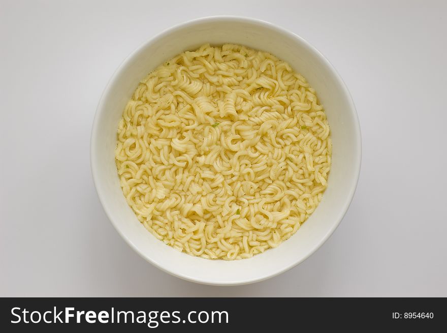 Fast noodles on a white plate