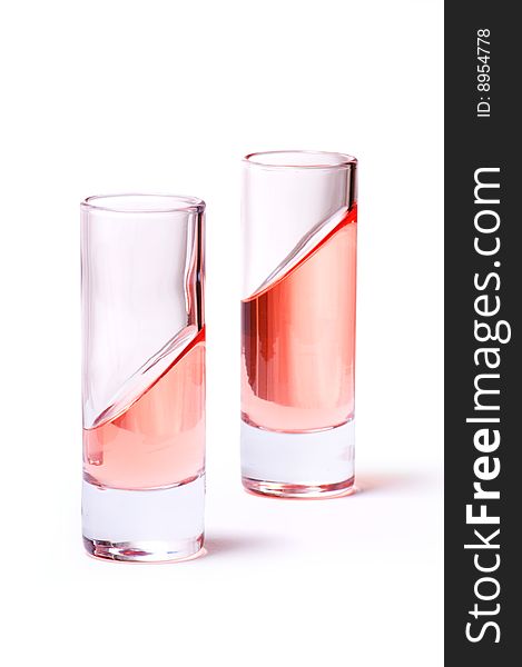 Thin glasses with pink liquid