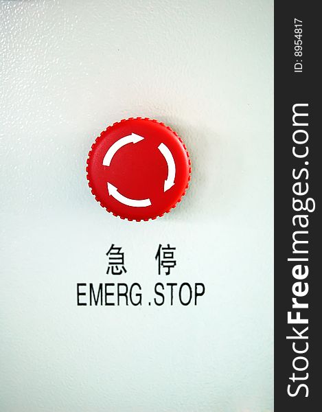 Emergency stop switch in Chinese over white background. Emergency stop switch in Chinese over white background