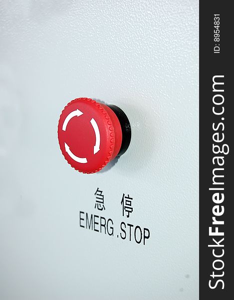 Emergency stop switch in Chinese over white background. Emergency stop switch in Chinese over white background