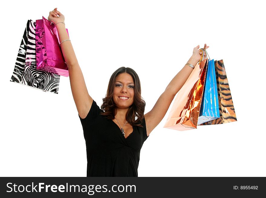 Half body view of young attractive woman doing shopping with lots of shopping bags. Isolated on white background. Half body view of young attractive woman doing shopping with lots of shopping bags. Isolated on white background.