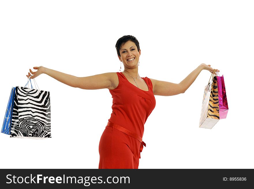 Half body view of young attractive woman doing shopping with lots of shopping bags. Isolated on white background. Half body view of young attractive woman doing shopping with lots of shopping bags. Isolated on white background.