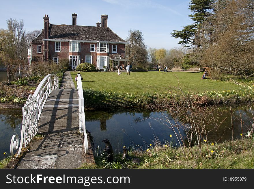 Newtimber Place is a Sussex moated house, built of flint and brick with a roof of Horsham stone. The original house was probably built by Richard Bellingham's son, who was Sheriff of Sussex in 1567.