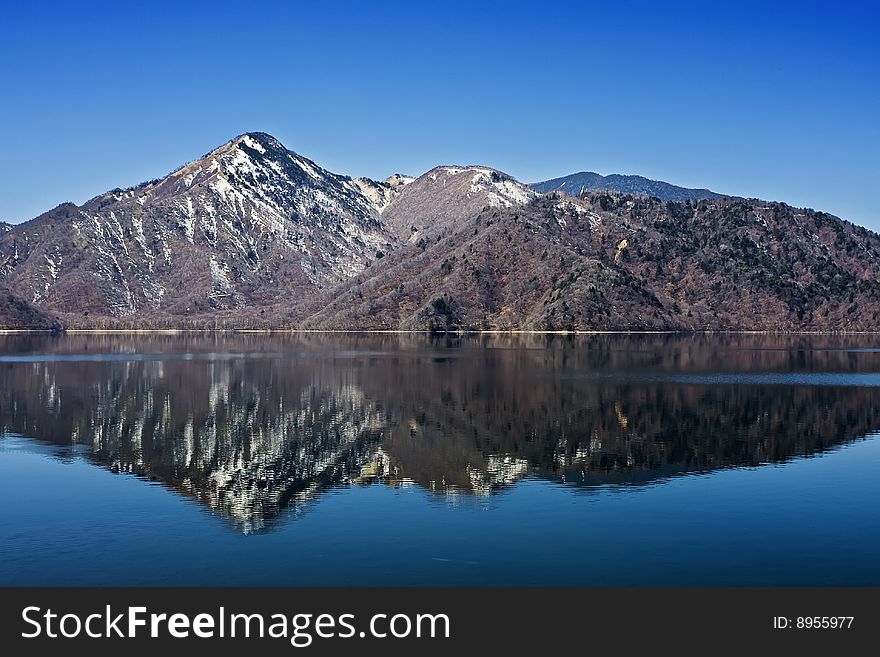 I took this one at Japanese world heritage which named nikko. The lake is so clear and the water is able to drink. You can see the mountain's  reflection clearly. The blue sky and the lake make the perfect combination. I took this one at Japanese world heritage which named nikko. The lake is so clear and the water is able to drink. You can see the mountain's  reflection clearly. The blue sky and the lake make the perfect combination.