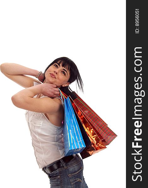 Half body view of young attractive woman doing shopping with lots of shopping bags. Isolated on white background. Half body view of young attractive woman doing shopping with lots of shopping bags. Isolated on white background.