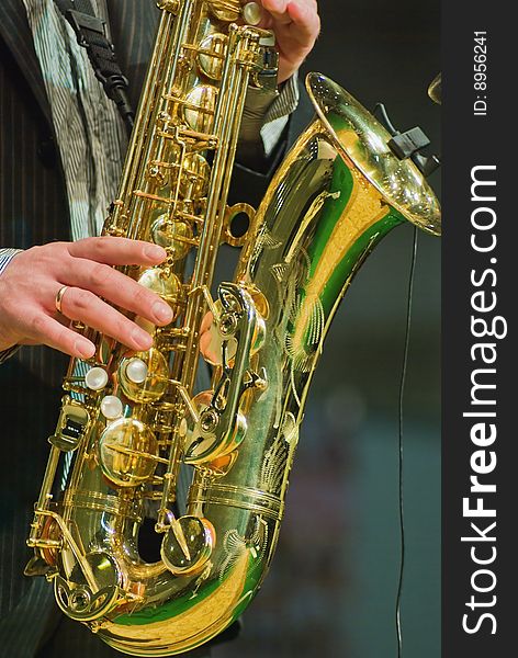 Saxophonist playing in live concert