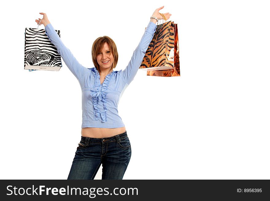 Half body view of young attractive woman doing shopping with lots of shopping bags. Isolated on white background. Half body view of young attractive woman doing shopping with lots of shopping bags. Isolated on white background.