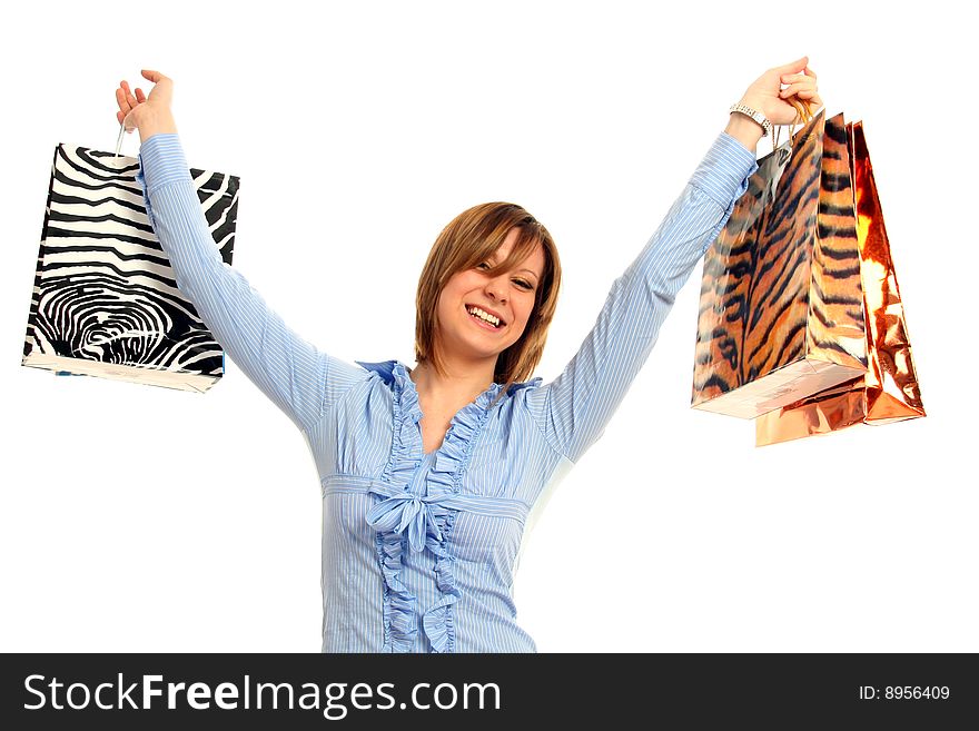 Half body view of young attractive woman doing shopping with lots of shopping bags. Isolated on white background. Half body view of young attractive woman doing shopping with lots of shopping bags. Isolated on white background.