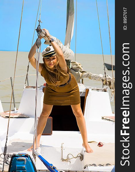 A young girl on the deck yacht. A young girl on the deck yacht