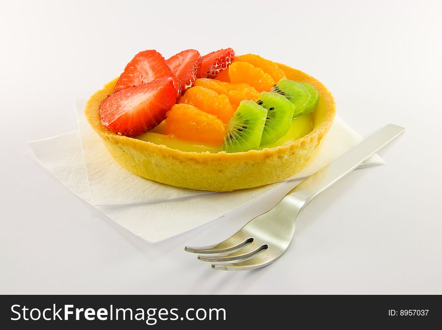 Fruit Tart With Fork On Napkin