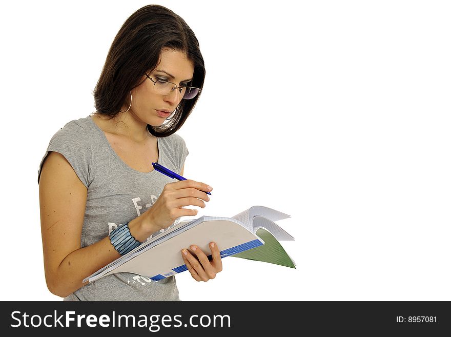 Half body view of college student in casual wear, holding exercise books. Isolated on white background.