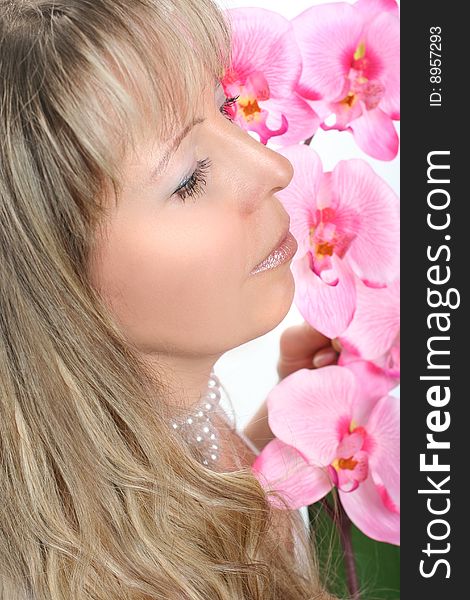 Beautiful adult woman with orchid. Beautiful adult woman with orchid