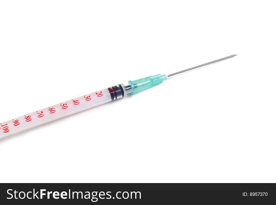 Medical syringe on a white background
