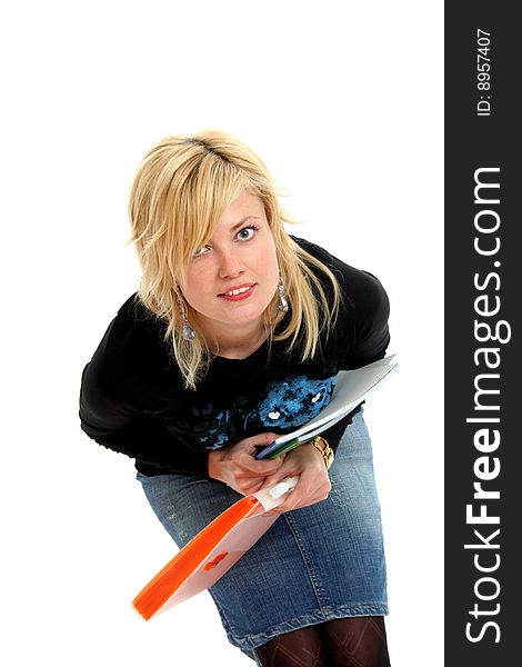 Half body view of college student in casual wear, holding exercise books. Isolated on white background.