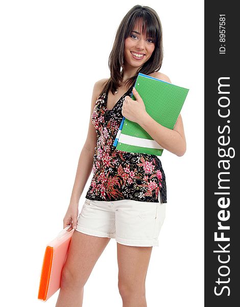 Half body view of college student in casual wear, holding exercise books. Isolated on white background.