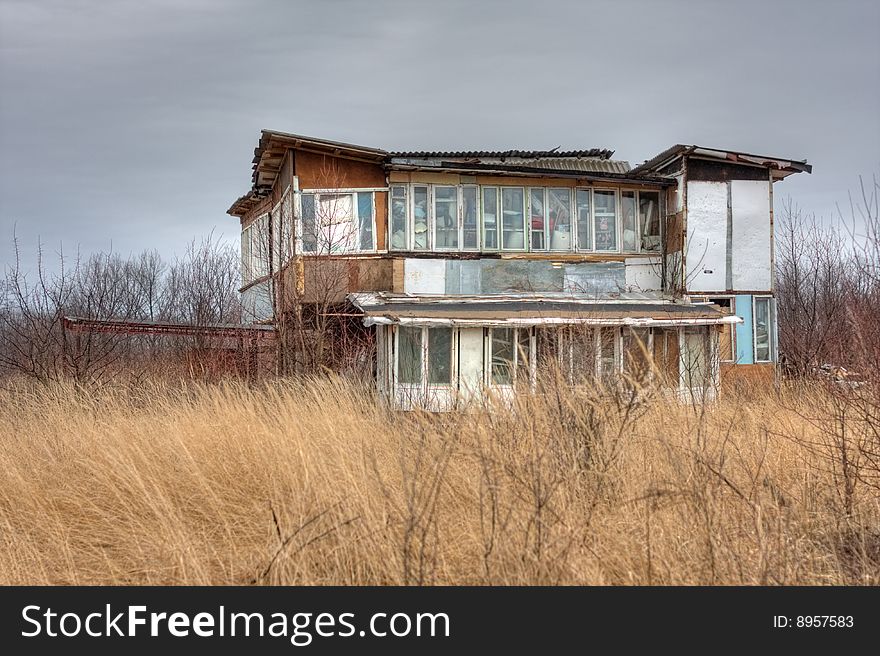 Obsolete Slum Cottage In The Field