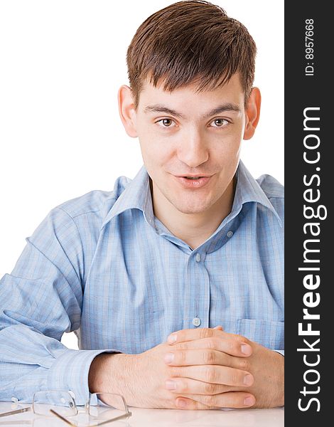 Young man in blue shirt on white background