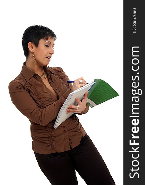 Half body view of college student in casual wear, holding exercise books. Isolated on white background.