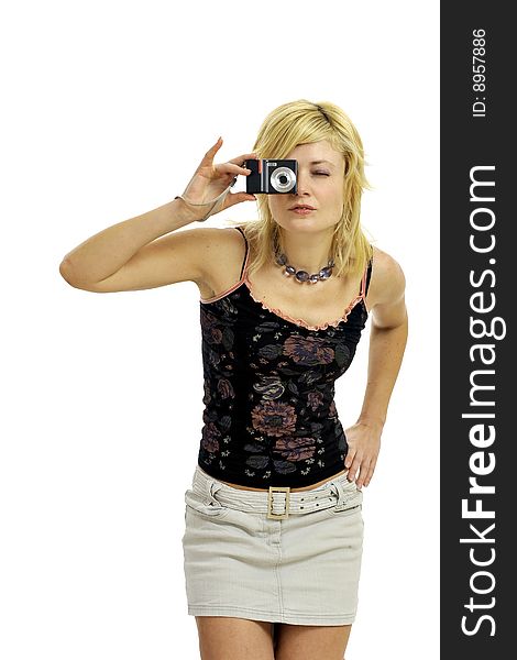 Half body view of lovely blond woman taking a picture with small camera. Isolated on white background. Half body view of lovely blond woman taking a picture with small camera. Isolated on white background.