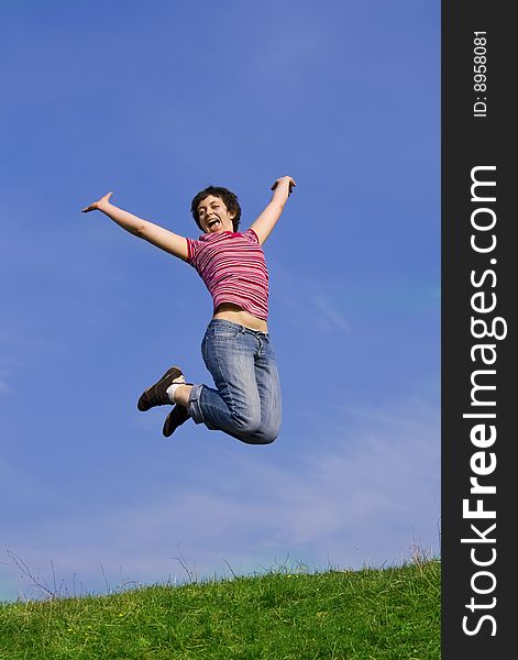 Young Happy Woman Jumping High