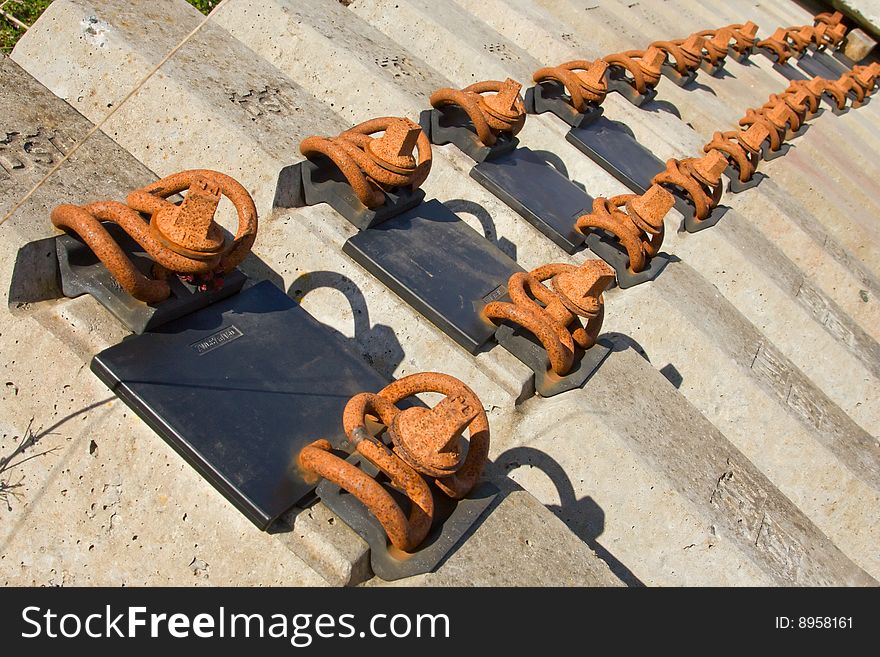 A row of a concrete rail sleepers and rusty bolts. A row of a concrete rail sleepers and rusty bolts