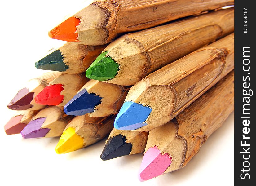 Handmade wooden color pencil laying in a peramid