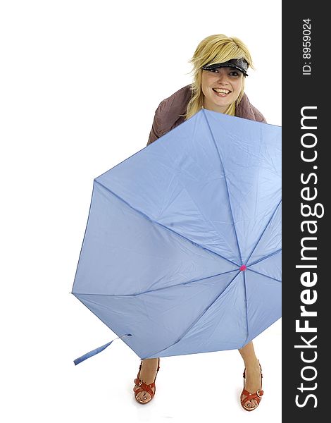 Half body view of woman with blue umbrella in casual wear, standing. Isolated on white background. Half body view of woman with blue umbrella in casual wear, standing. Isolated on white background.