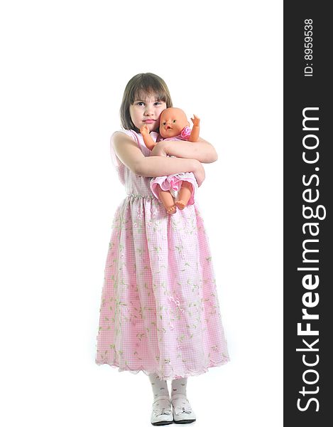 Little cute girl with doll isolated on the white background