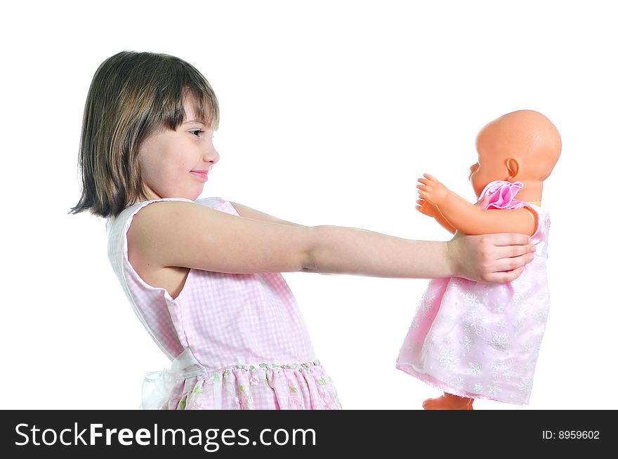 Happy girl with doll isolated on the white background