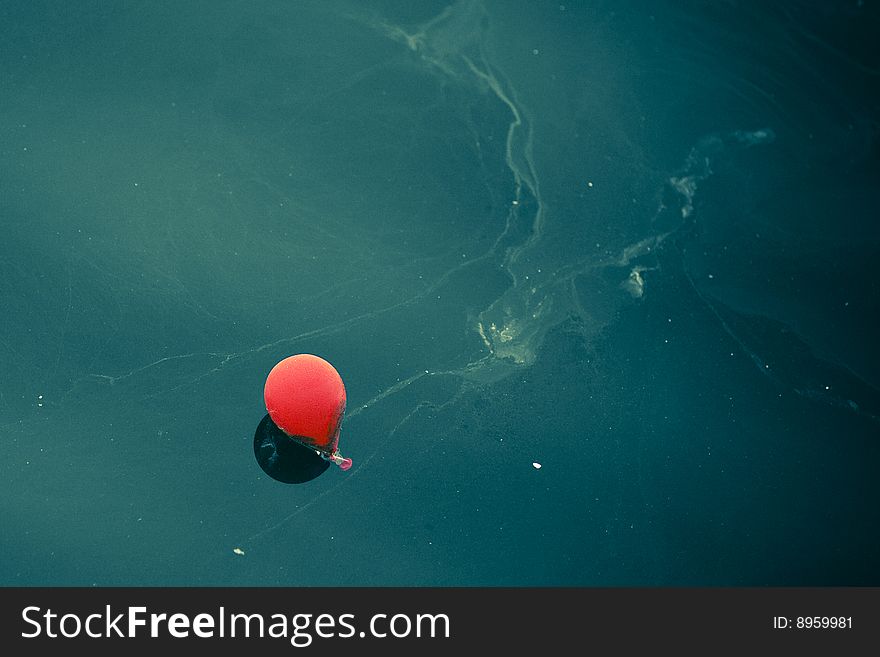 Water and red baloon at barcelona port