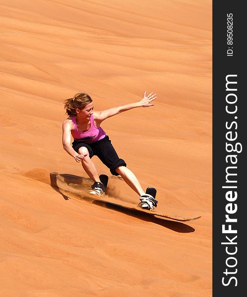 Woman In Doing Sun Boarding During Daytime