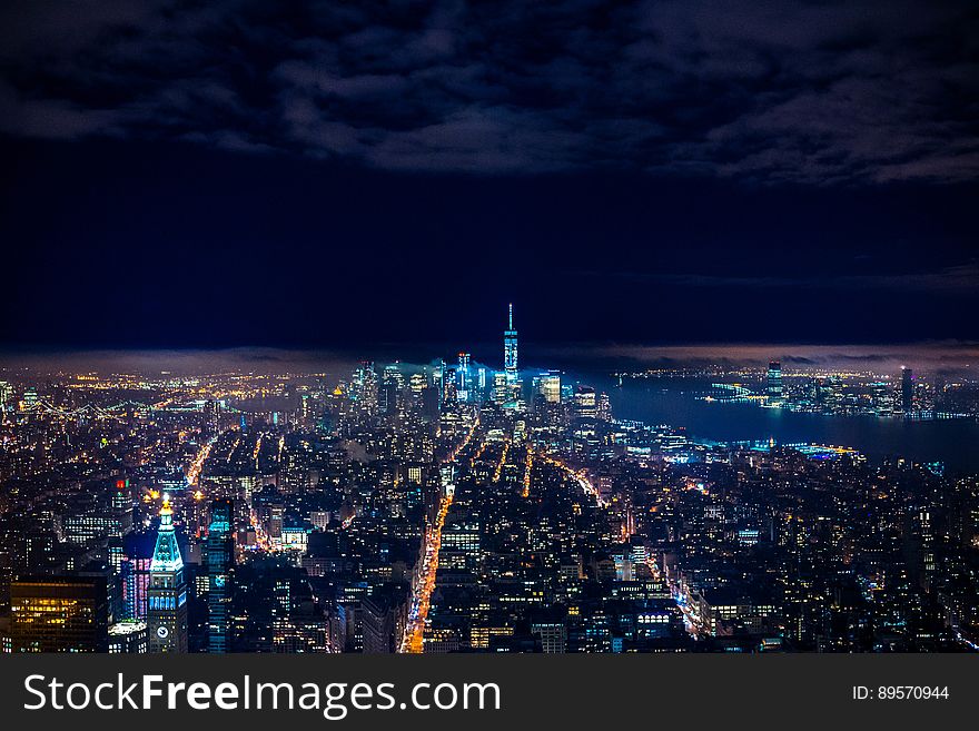 A panoramic view of a metropolitan city at night. A panoramic view of a metropolitan city at night.