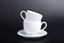 Two Cups Of White On  Black Royalty Free Stock Images