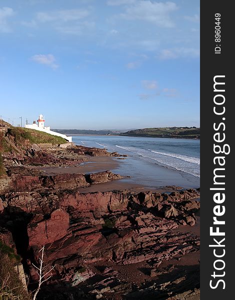 Lighthouse captured on the high ground overlooking the cliffs. Lighthouse captured on the high ground overlooking the cliffs