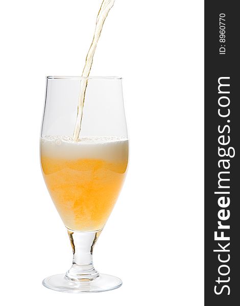 Glass with poured beer isolated on a white background. Glass with poured beer isolated on a white background