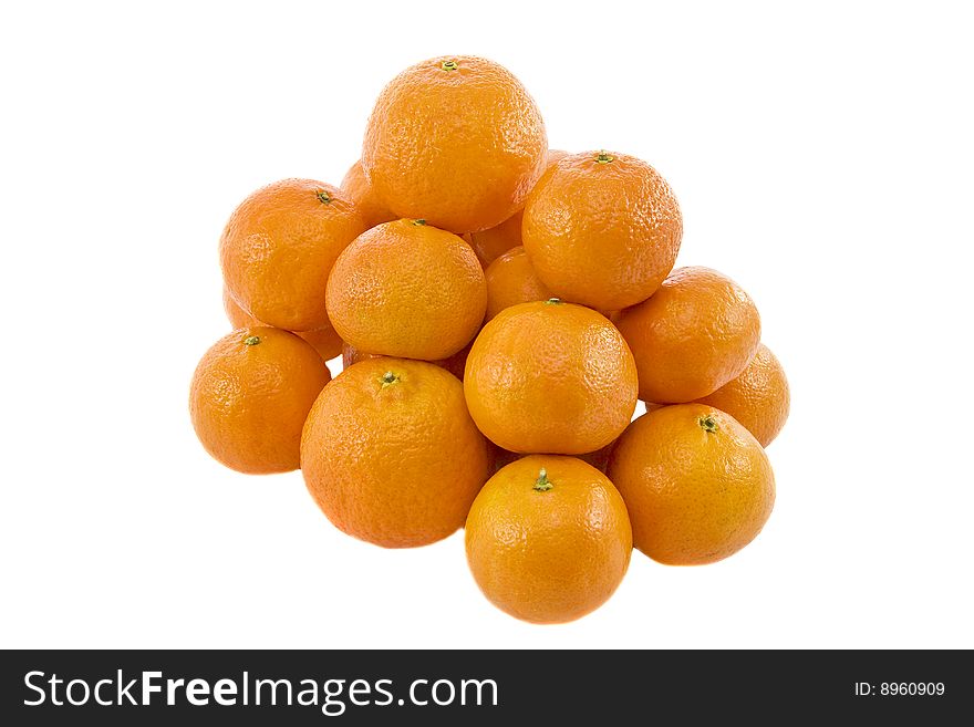 Heap of ripe fresh juicy tangerines isolated over white background