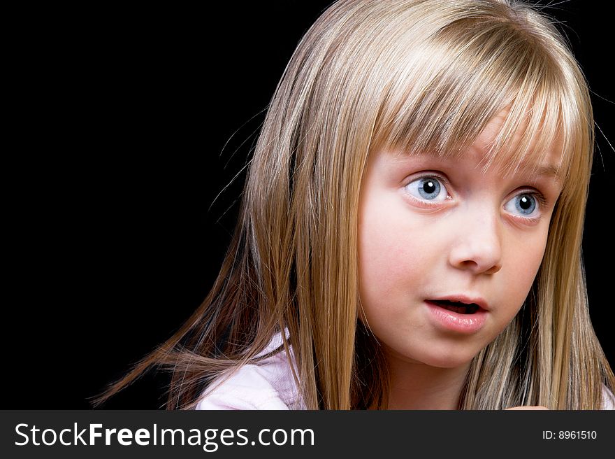 Blond Girl with big blue eyes on a black background