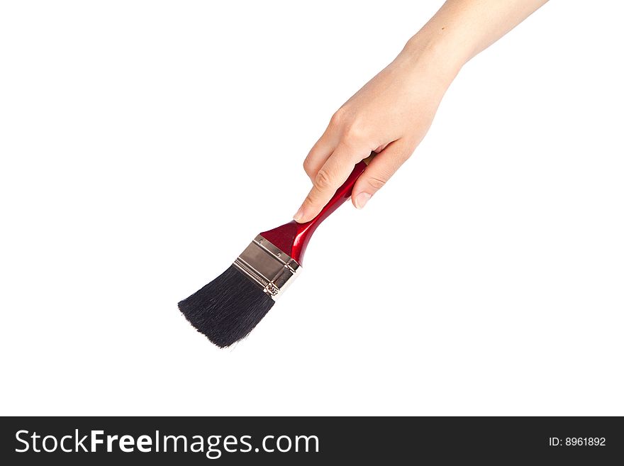 Hand Holding a paint brush on white background. Hand Holding a paint brush on white background