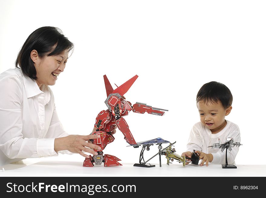 Mother and son play 3d Diy robot. Mother and son play 3d Diy robot
