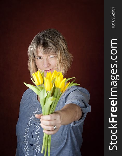 Woman with Yellow Tulips