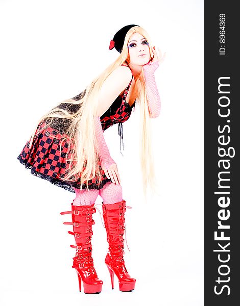 Studio shot of a young girl dressed up like japanese harajuku style girls. Studio shot of a young girl dressed up like japanese harajuku style girls