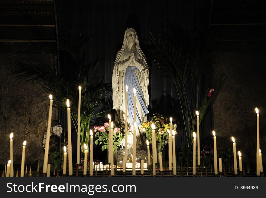 Statues Of Saint Marie With Candle Light