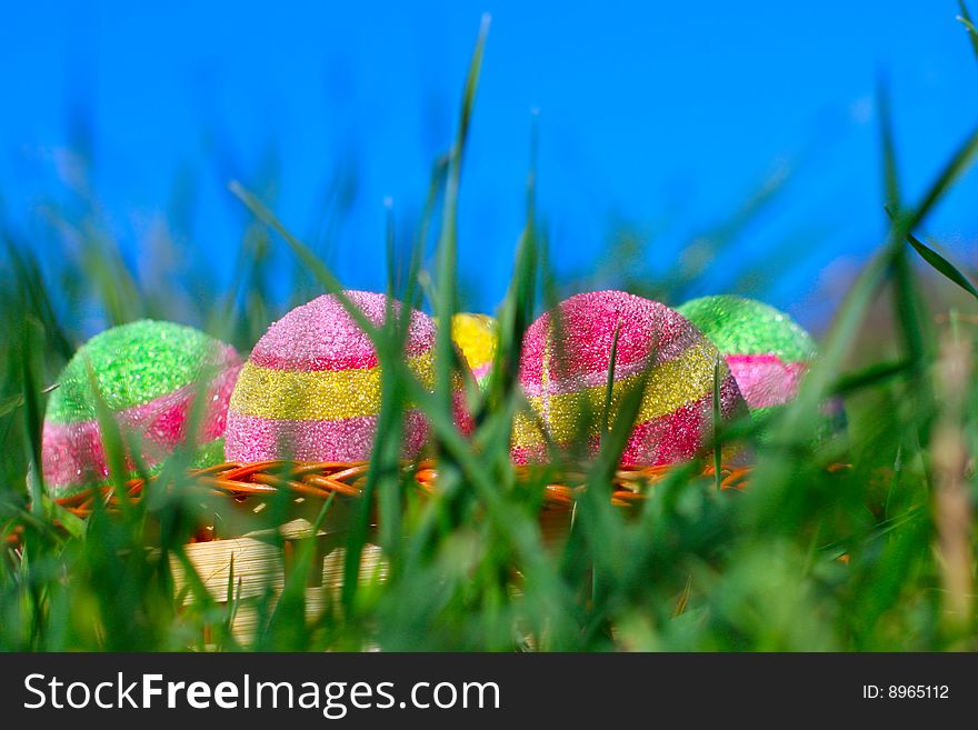 Easter eggs on a green grass