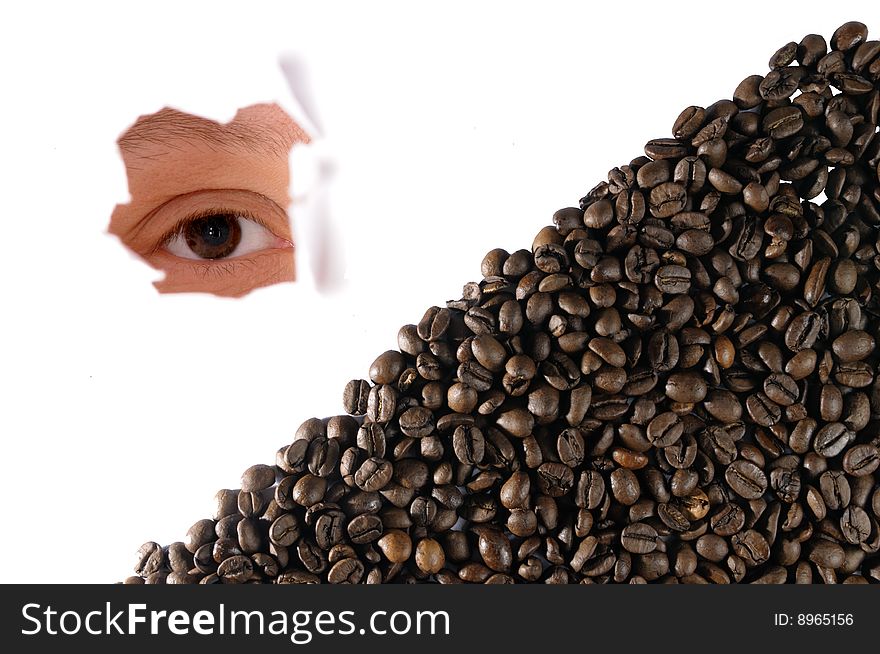 Coffee beans and a girls eye looking through the hole in background. Coffee beans and a girls eye looking through the hole in background