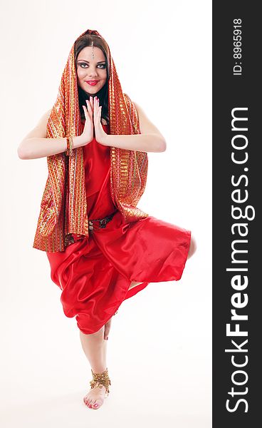 Girl in red dancing in indian style. Girl in red dancing in indian style