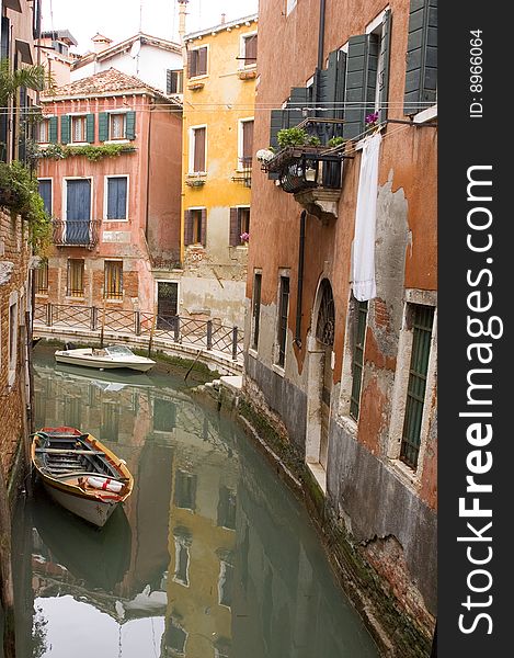 Canal in ancient Venice Italy with boats. Canal in ancient Venice Italy with boats