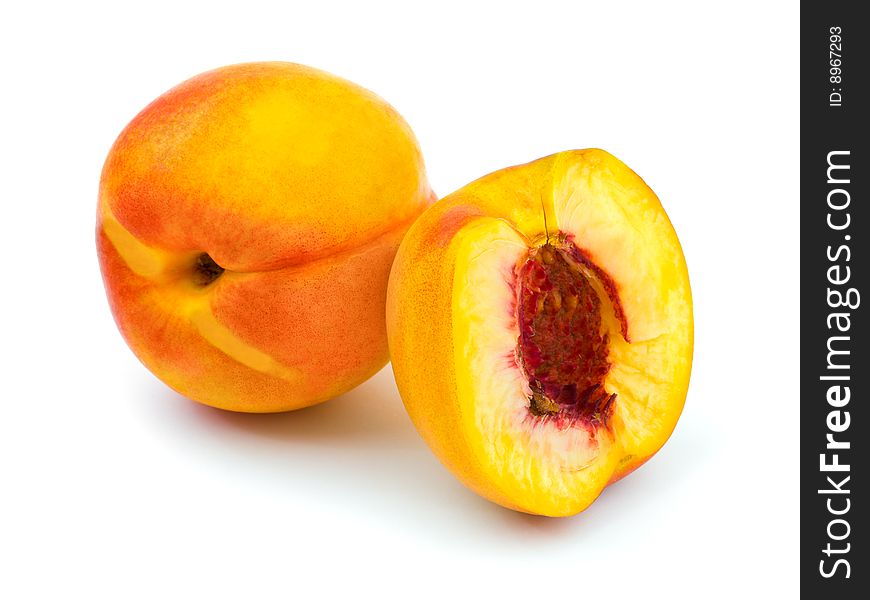 Ripe peach fruits isolated on white background