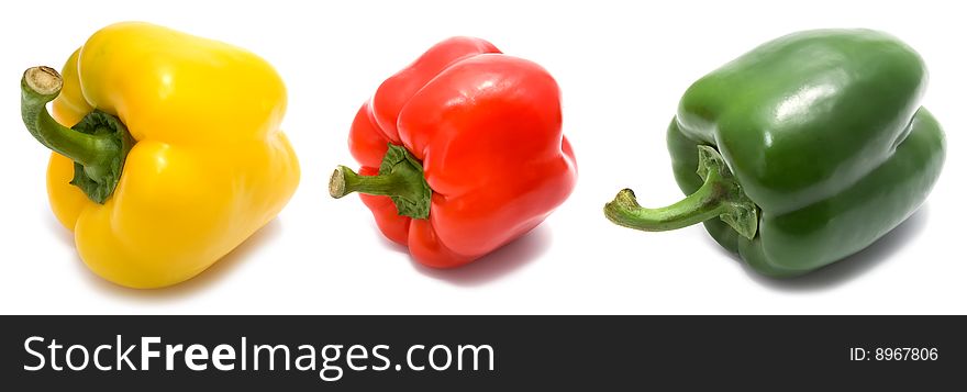 Set of three different peppers isolated on white background