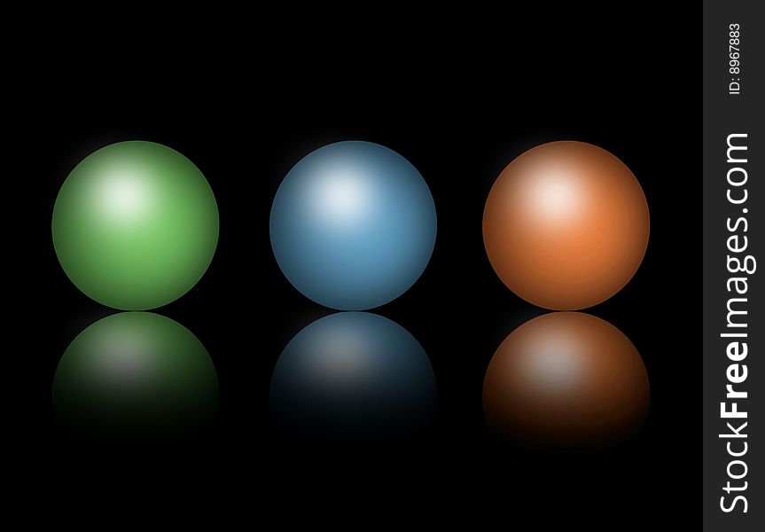 Green, blue and red spheres on black background. Green, blue and red spheres on black background